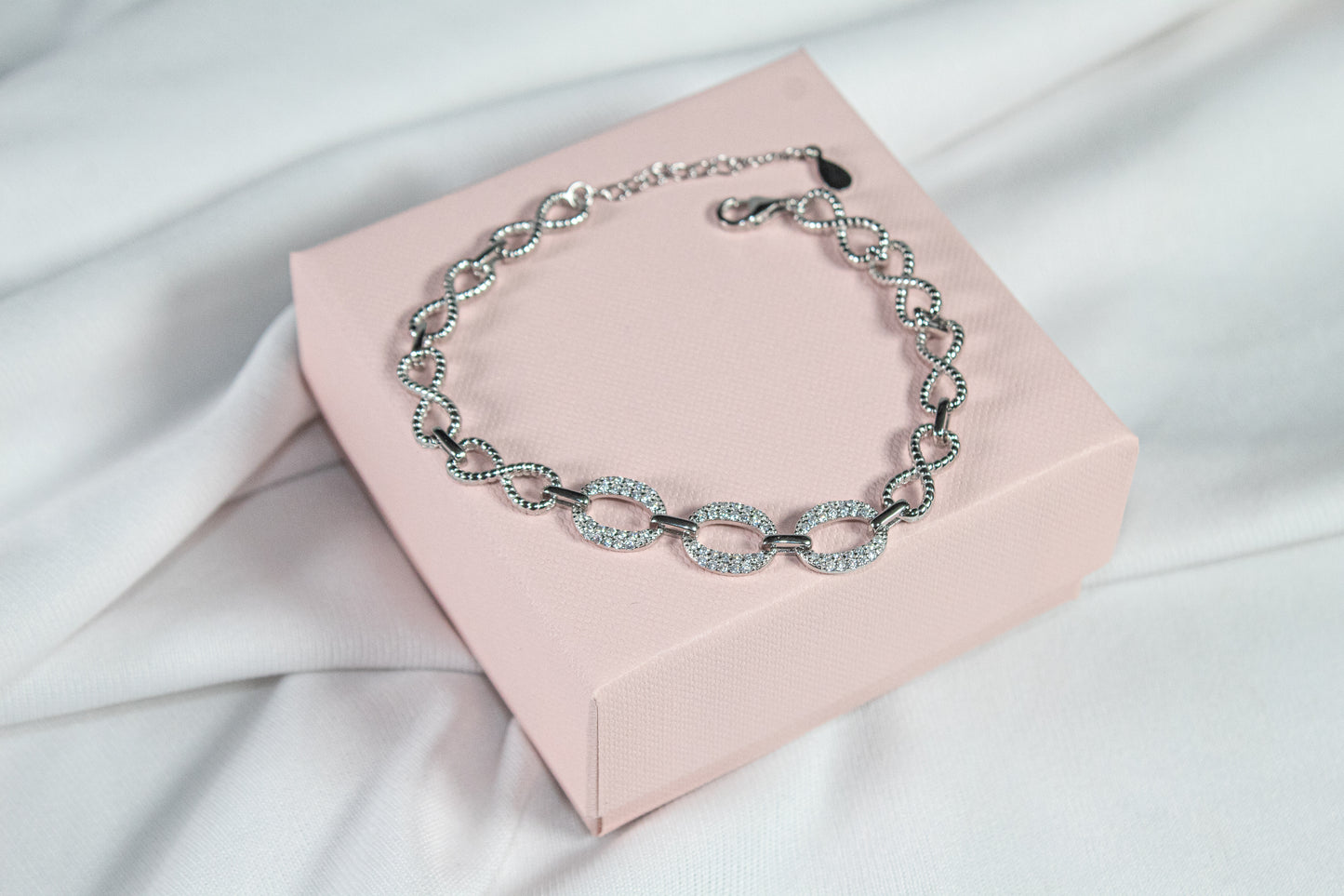Infinity Loop Crystal Charm