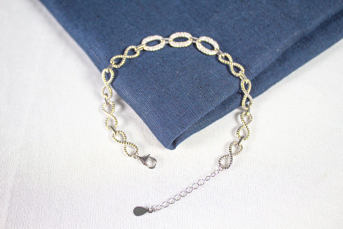 Infinity Loop Crystal Charm